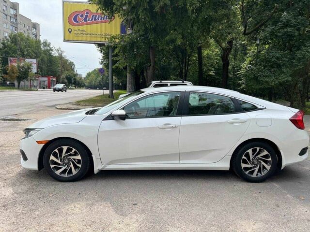 Белый Хонда Цивик, объемом двигателя 2 л и пробегом 95 тыс. км за 11800 $, фото 16 на Automoto.ua