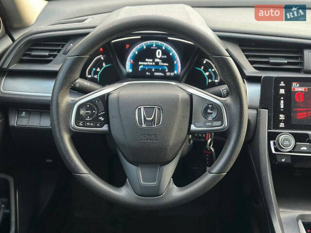 Белый Хонда Цивик, объемом двигателя 2 л и пробегом 153 тыс. км за 12950 $, фото 28 на Automoto.ua