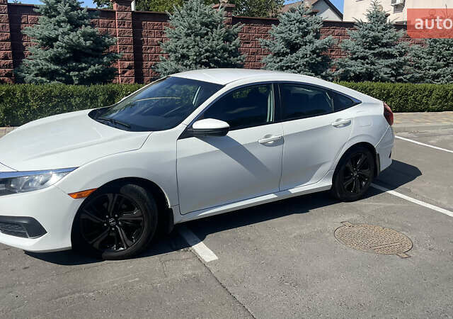 Белый Хонда Цивик, объемом двигателя 2 л и пробегом 67 тыс. км за 13900 $, фото 17 на Automoto.ua