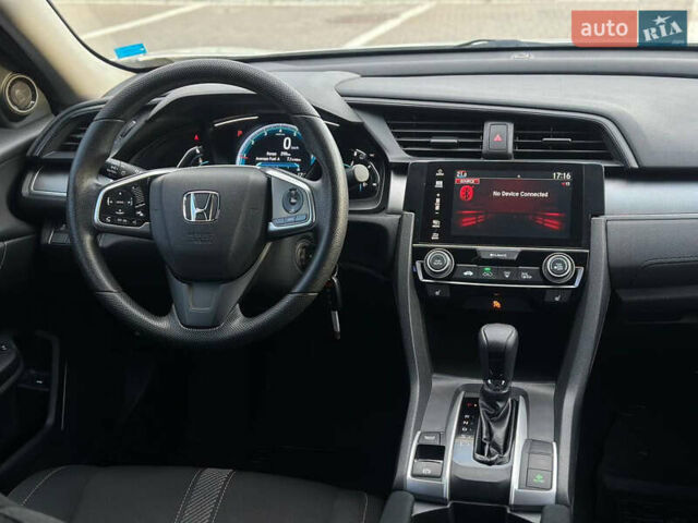 Белый Хонда Цивик, объемом двигателя 2 л и пробегом 153 тыс. км за 12950 $, фото 25 на Automoto.ua