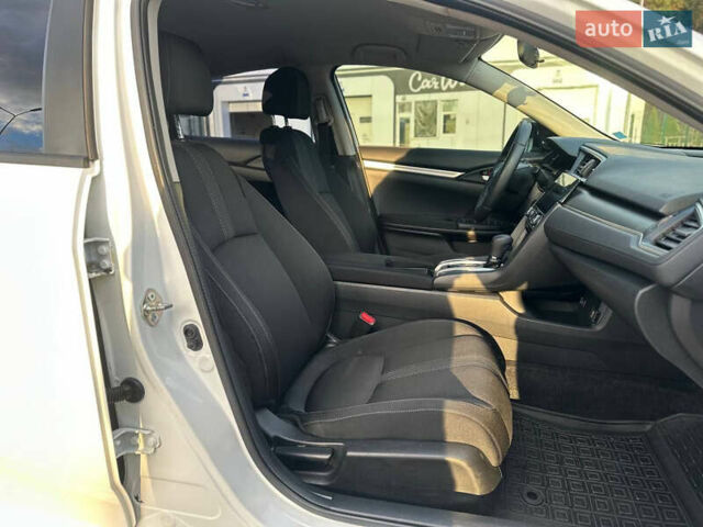 Белый Хонда Цивик, объемом двигателя 2 л и пробегом 153 тыс. км за 12950 $, фото 33 на Automoto.ua