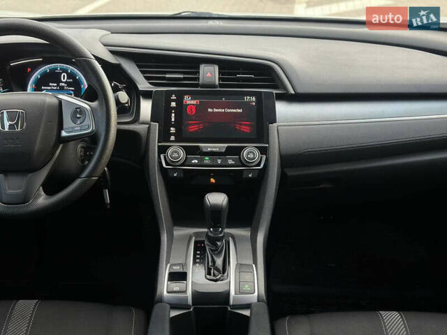 Белый Хонда Цивик, объемом двигателя 2 л и пробегом 153 тыс. км за 12950 $, фото 21 на Automoto.ua