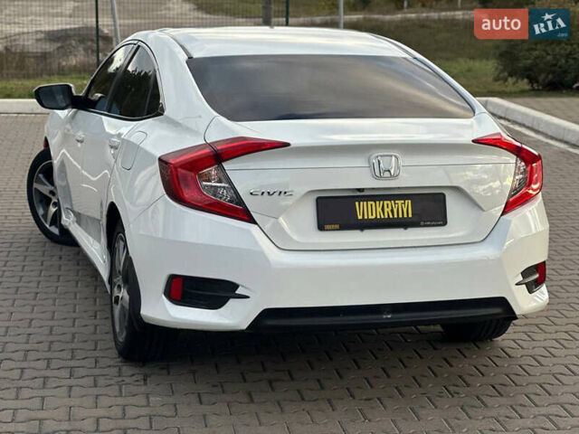 Белый Хонда Цивик, объемом двигателя 2 л и пробегом 153 тыс. км за 12950 $, фото 15 на Automoto.ua