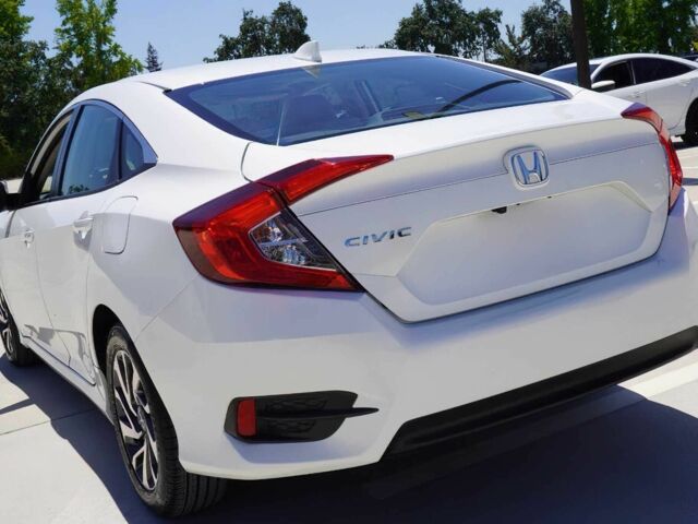 Білий Хонда Сівік, об'ємом двигуна 2 л та пробігом 50 тис. км за 9000 $, фото 4 на Automoto.ua