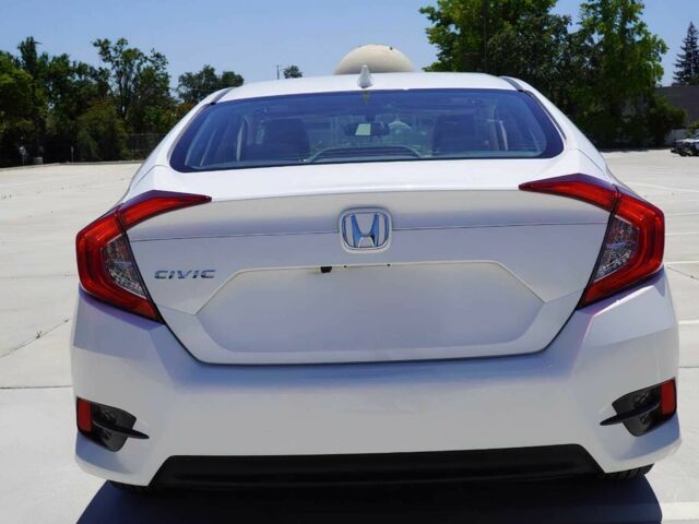 Білий Хонда Сівік, об'ємом двигуна 2 л та пробігом 50 тис. км за 9000 $, фото 5 на Automoto.ua