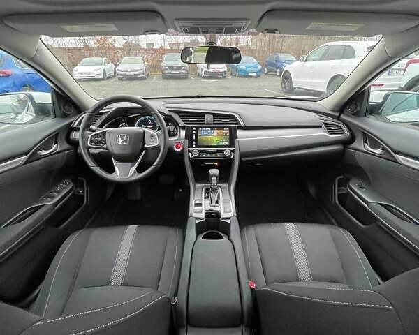 Белый Хонда Цивик, объемом двигателя 2 л и пробегом 62 тыс. км за 13800 $, фото 26 на Automoto.ua