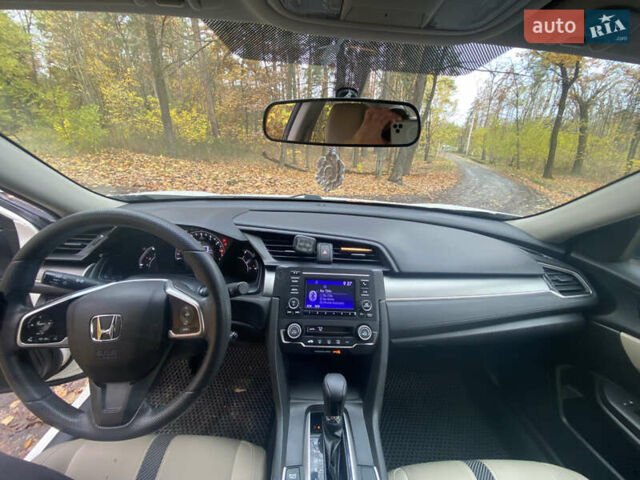 Белый Хонда Цивик, объемом двигателя 2 л и пробегом 91 тыс. км за 13500 $, фото 10 на Automoto.ua