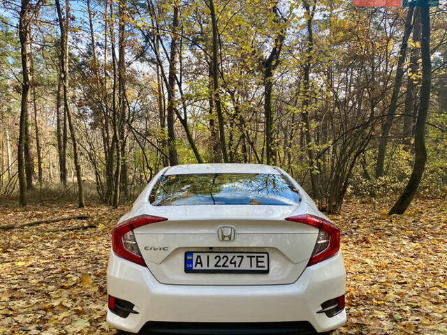 Белый Хонда Цивик, объемом двигателя 2 л и пробегом 91 тыс. км за 13500 $, фото 3 на Automoto.ua