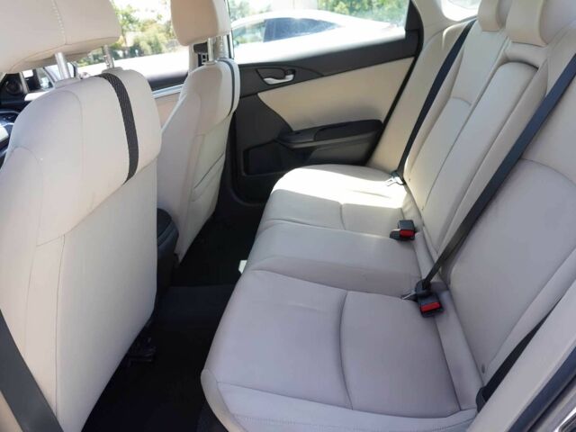 Білий Хонда Сівік, об'ємом двигуна 2 л та пробігом 50 тис. км за 9000 $, фото 13 на Automoto.ua