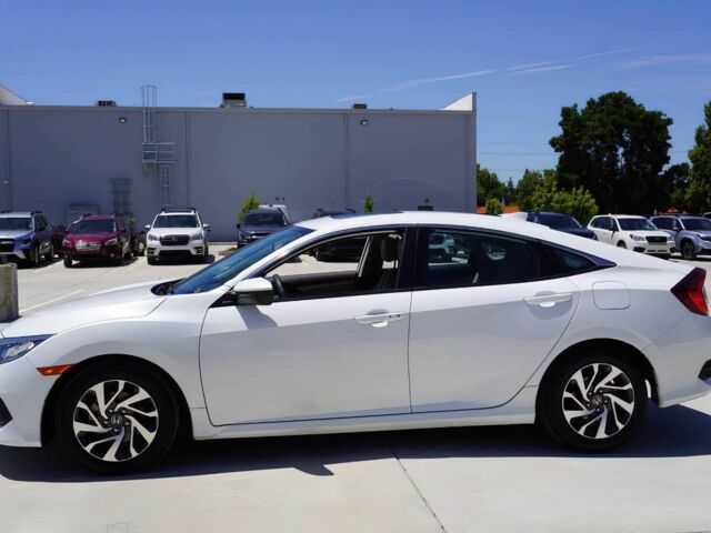 Білий Хонда Сівік, об'ємом двигуна 2 л та пробігом 50 тис. км за 9000 $, фото 3 на Automoto.ua