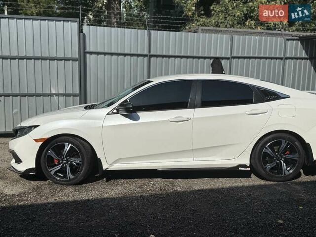 Белый Хонда Цивик, объемом двигателя 2 л и пробегом 74 тыс. км за 16300 $, фото 13 на Automoto.ua