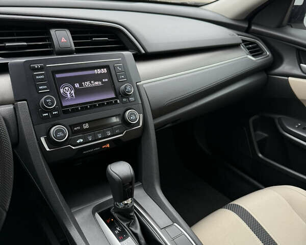 Белый Хонда Цивик, объемом двигателя 2 л и пробегом 88 тыс. км за 13500 $, фото 19 на Automoto.ua