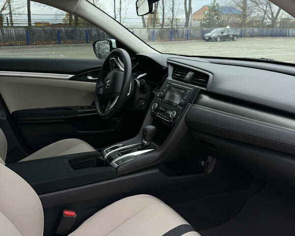 Белый Хонда Цивик, объемом двигателя 2 л и пробегом 88 тыс. км за 13500 $, фото 12 на Automoto.ua