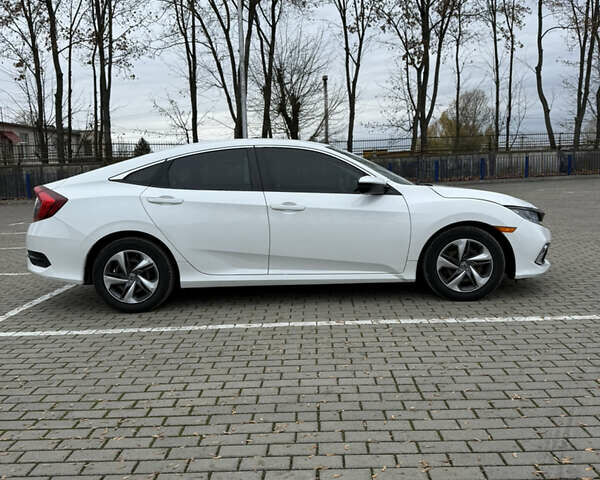 Белый Хонда Цивик, объемом двигателя 2 л и пробегом 88 тыс. км за 13500 $, фото 4 на Automoto.ua