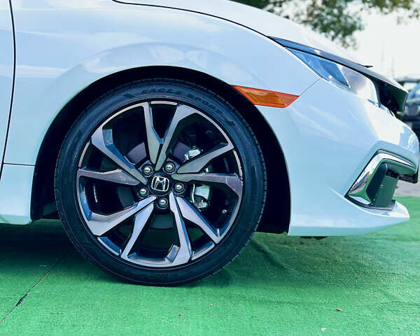 Белый Хонда Цивик, объемом двигателя 2 л и пробегом 14 тыс. км за 15200 $, фото 5 на Automoto.ua