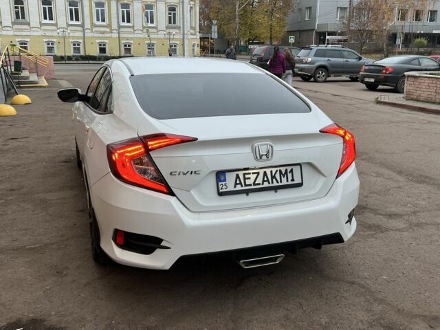 Белый Хонда Цивик, объемом двигателя 2 л и пробегом 110 тыс. км за 16000 $, фото 4 на Automoto.ua
