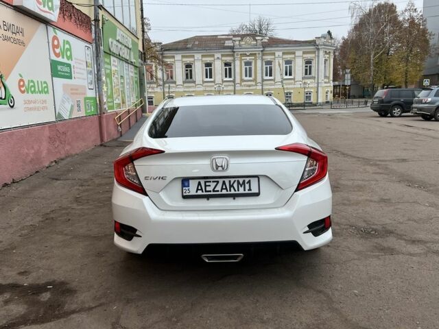 Белый Хонда Цивик, объемом двигателя 2 л и пробегом 110 тыс. км за 16000 $, фото 2 на Automoto.ua