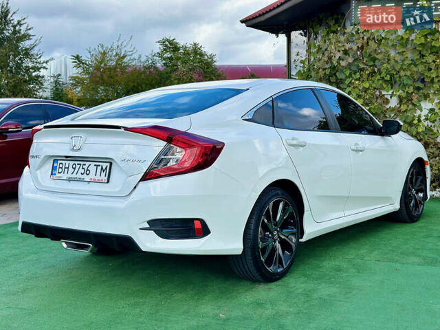 Белый Хонда Цивик, объемом двигателя 2 л и пробегом 14 тыс. км за 15200 $, фото 9 на Automoto.ua