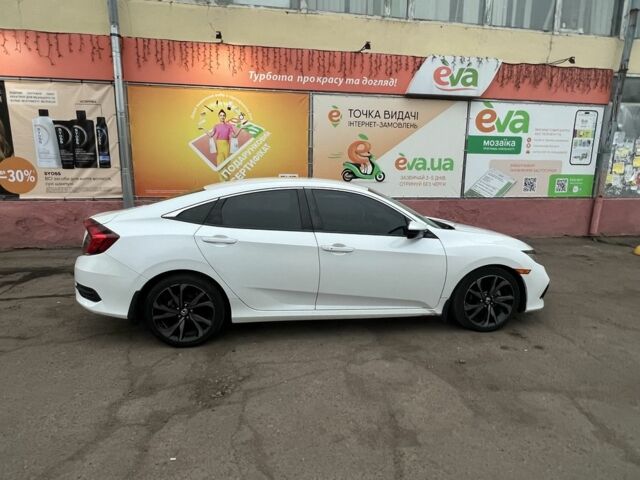 Белый Хонда Цивик, объемом двигателя 2 л и пробегом 110 тыс. км за 16000 $, фото 5 на Automoto.ua