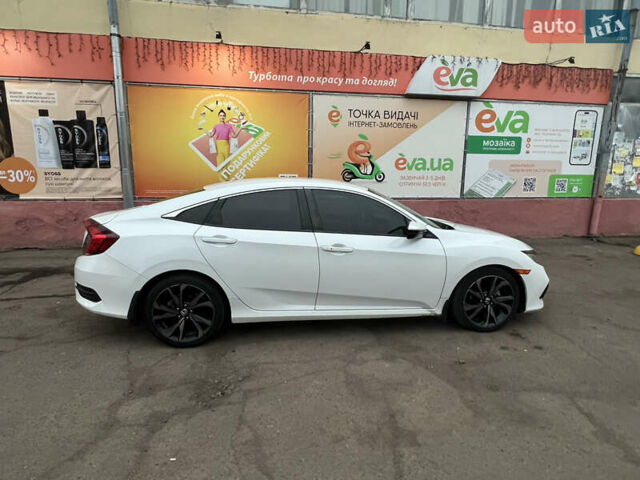 Белый Хонда Цивик, объемом двигателя 2 л и пробегом 110 тыс. км за 16000 $, фото 5 на Automoto.ua