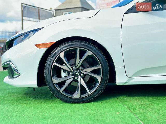 Белый Хонда Цивик, объемом двигателя 2 л и пробегом 14 тыс. км за 15200 $, фото 4 на Automoto.ua