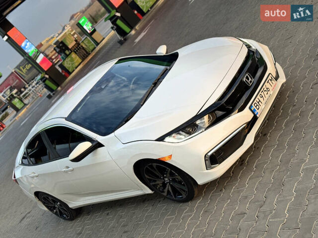 Белый Хонда Цивик, объемом двигателя 2 л и пробегом 14 тыс. км за 15200 $, фото 23 на Automoto.ua
