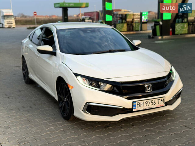 Белый Хонда Цивик, объемом двигателя 2 л и пробегом 14 тыс. км за 15200 $, фото 26 на Automoto.ua