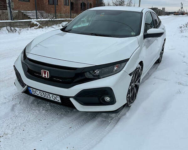 Белый Хонда Цивик, объемом двигателя 2 л и пробегом 90 тыс. км за 16800 $, фото 2 на Automoto.ua