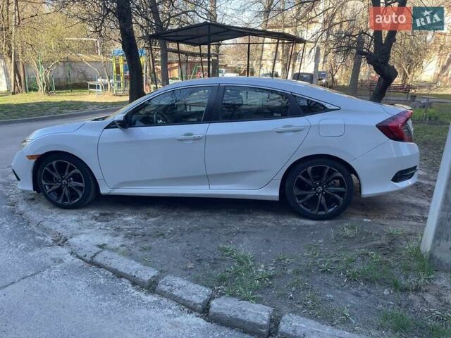 Белый Хонда Цивик, объемом двигателя 2 л и пробегом 24 тыс. км за 18000 $, фото 5 на Automoto.ua