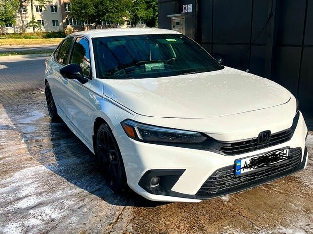 Белый Хонда Цивик, объемом двигателя 2 л и пробегом 77 тыс. км за 19900 $, фото 3 на Automoto.ua