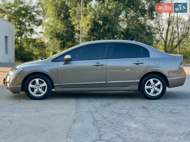 Бежевий Хонда Сівік, об'ємом двигуна 1.3 л та пробігом 235 тис. км за 5499 $, фото 7 на Automoto.ua