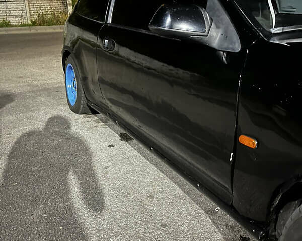 Черный Хонда Цивик, объемом двигателя 1.3 л и пробегом 400 тыс. км за 2200 $, фото 10 на Automoto.ua