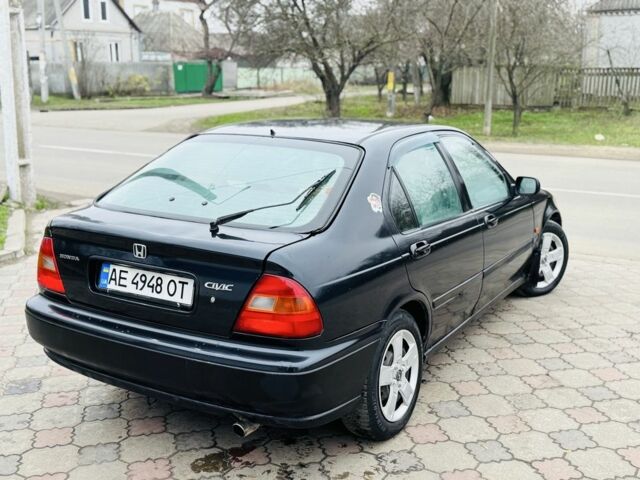 Черный Хонда Цивик, объемом двигателя 1.4 л и пробегом 200 тыс. км за 1750 $, фото 4 на Automoto.ua
