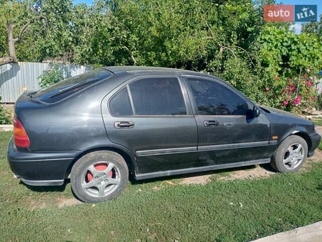 Черный Хонда Цивик, объемом двигателя 1.4 л и пробегом 338 тыс. км за 1700 $, фото 4 на Automoto.ua