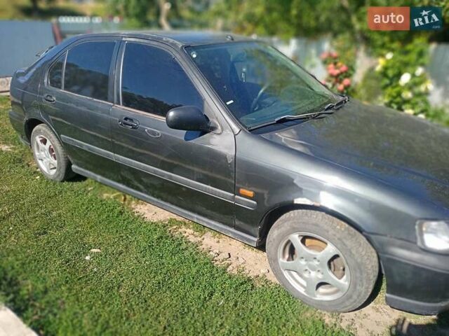 Черный Хонда Цивик, объемом двигателя 1.4 л и пробегом 338 тыс. км за 1700 $, фото 2 на Automoto.ua