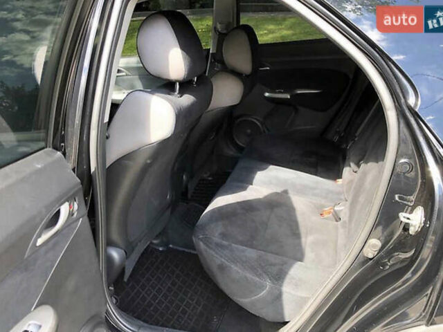 Черный Хонда Цивик, объемом двигателя 1.8 л и пробегом 135 тыс. км за 6000 $, фото 11 на Automoto.ua