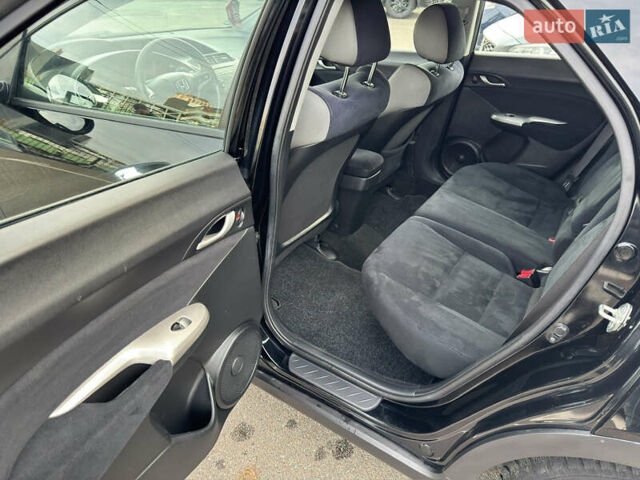 Черный Хонда Цивик, объемом двигателя 1.4 л и пробегом 153 тыс. км за 8800 $, фото 24 на Automoto.ua