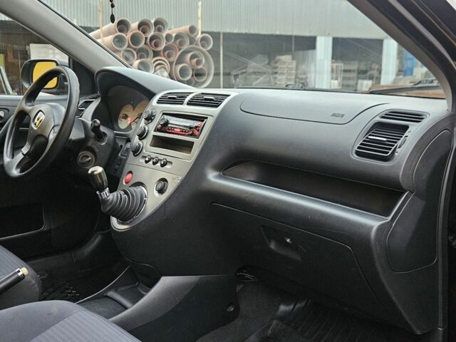 Хонда Цивик 2005 в Житомире на Automoto.ua Черный Хонда Цивик, объемом двигателя 2 л и пробегом 270 тыс. км за 2257 $, фото 20 на Automoto.ua