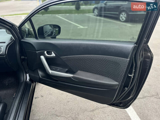 Черный Хонда Цивик, объемом двигателя 1.8 л и пробегом 147 тыс. км за 8888 $, фото 31 на Automoto.ua