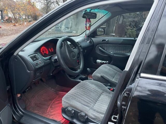 Черный Хонда Цивик, объемом двигателя 1.4 л и пробегом 355 тыс. км за 2800 $, фото 6 на Automoto.ua