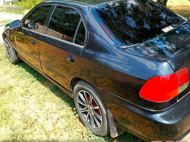 Хонда Цивик 1998 в Кропивницком (Кировограде) на Automoto.ua Черный Хонда Цивик, объемом двигателя 1.4 л и пробегом 250 тыс. км за 1900 $, фото 3 на Automoto.ua