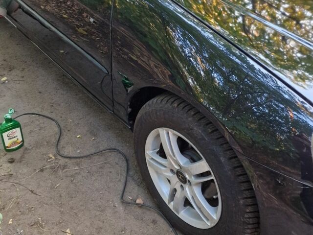 Черный Хонда Цивик, объемом двигателя 1.7 л и пробегом 250 тыс. км за 3700 $, фото 3 на Automoto.ua