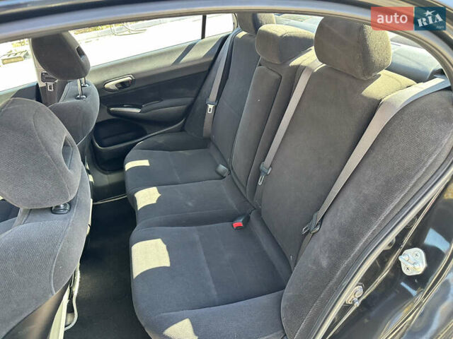 Черный Хонда Цивик, объемом двигателя 1.8 л и пробегом 324 тыс. км за 5800 $, фото 17 на Automoto.ua