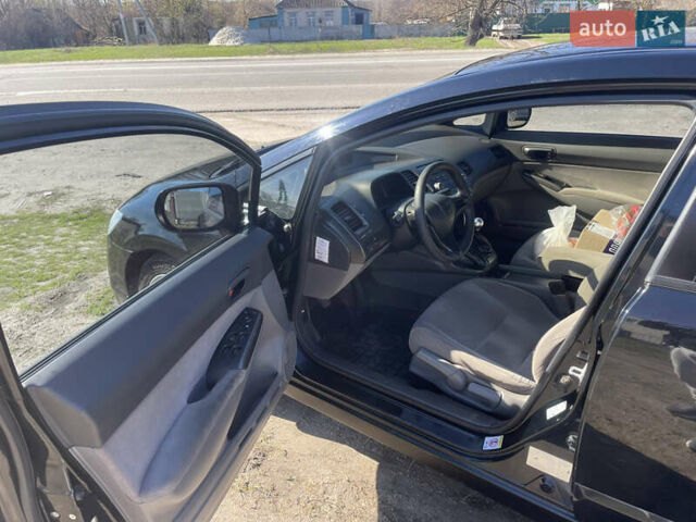Черный Хонда Цивик, объемом двигателя 1.8 л и пробегом 242 тыс. км за 6000 $, фото 11 на Automoto.ua
