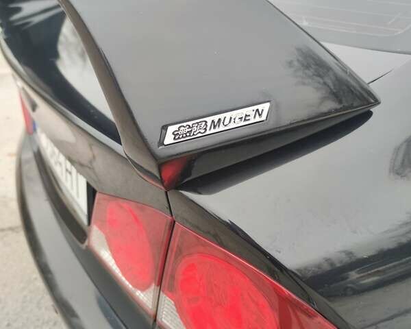 Черный Хонда Цивик, объемом двигателя 1.8 л и пробегом 197 тыс. км за 6999 $, фото 6 на Automoto.ua