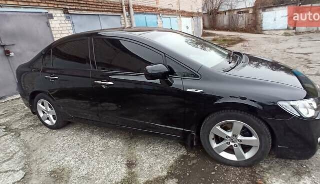 Чорний Хонда Сівік, об'ємом двигуна 1.8 л та пробігом 241 тис. км за 7200 $, фото 1 на Automoto.ua