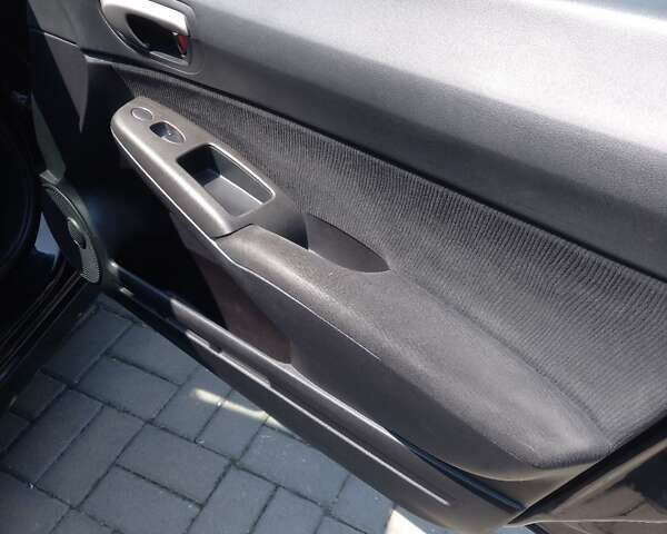 Черный Хонда Цивик, объемом двигателя 1.8 л и пробегом 274 тыс. км за 5000 $, фото 12 на Automoto.ua