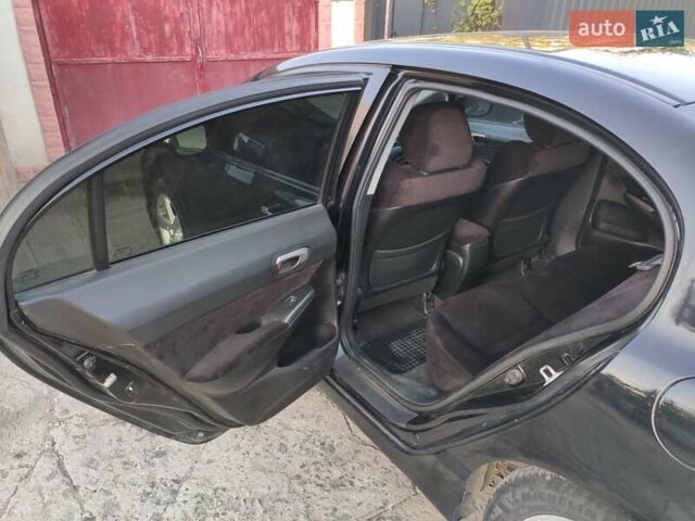 Черный Хонда Цивик, объемом двигателя 1.8 л и пробегом 239 тыс. км за 5500 $, фото 3 на Automoto.ua