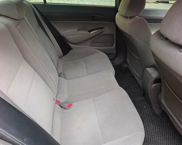 Черный Хонда Цивик, объемом двигателя 1.8 л и пробегом 237 тыс. км за 6400 $, фото 10 на Automoto.ua