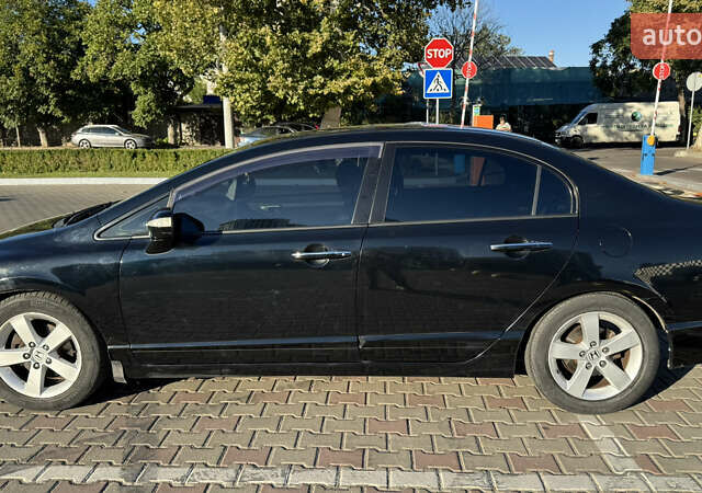 Черный Хонда Цивик, объемом двигателя 1.8 л и пробегом 201 тыс. км за 5999 $, фото 15 на Automoto.ua